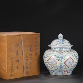 A WUCAI MEDALLION 'SANSKRIT AND FRUITS' COVERED JAR