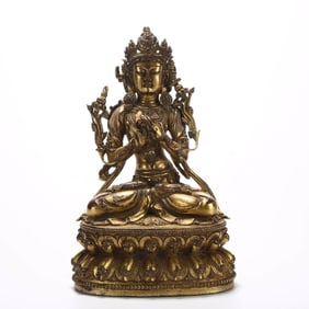A GILT BRONZE 'MANJUSHRI' FIGURE