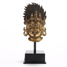 A GILT BRONZE BUDDHA HEAD