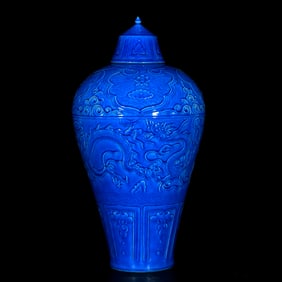 A TURQUOISE-GLAZED CARVED 'DRAGON' MEIPING
