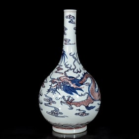 A BLUE AND WHITE WITH UNDERGLAZED RED 'DRAGON'  VASE