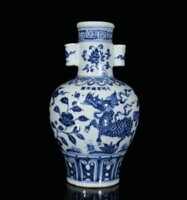 A BLUE AND WHITE 'QILIN' PIERCED-HANDLE VASE