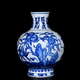 A BLUE AND WHITE 'NINE PEACHES' POMEGRANATE-SHAPED VASE