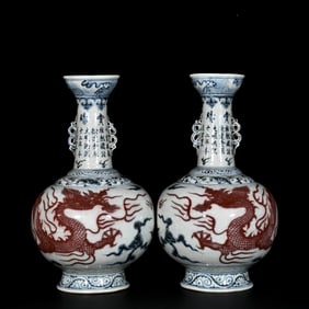 A PAIR OF BLUE AND WHITE WITH UNDERGLAZED RED 'DRAGON'  VASES