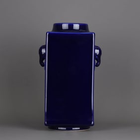 A  BLUE-GLAZED ELEPHANT-HANDLED CONG-SHAPED VASE