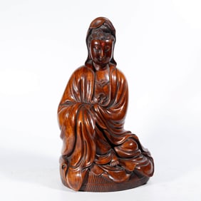 A RED SANDALWOOD AND GEMSTONE INLAY 'GUANYIN' FIGURE