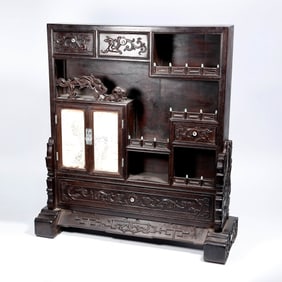 A RED SANDALWOOD 'AUSPICIOUS BEASTS' DISPLAY STAND