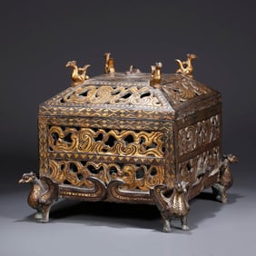 A GOLD-INLAID 'GEOMETRIC ' QUADRIPOD CENSER