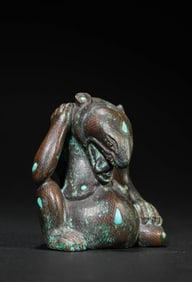 A BRONZE 'BEAR' INLAID WITH GOLD AND GEMS