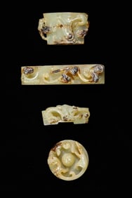 A GROUP OF JADE ORNAMENTS