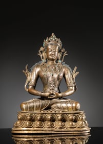 A SILVER-GILT AMITAYUS BUDDHA