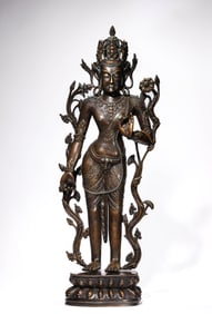 A TIBETAN PALA-STYLE ALLOY COPPER GREEN TARA INLAID WITH SILVER AND COPPER