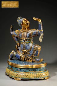 A CLOISONNé ENAMEL FOREIGN FIGURE