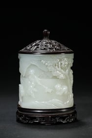 A JADE CARVED FIGURE SCENE CENSER