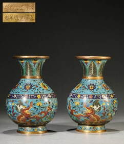 A PAIR OF CLOISONNé ENAMEL 'DRAGON IN WAVES' VASES