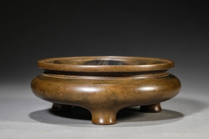 A BRONZE LI-FORM CENSER