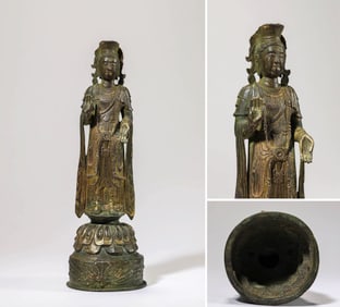 A GILT-BRONZE BUDDHIST FIGURE