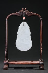 A JADE CARVED 'SCHOLARS UNDER PINE WITH POEM' GOURD PLAQUE