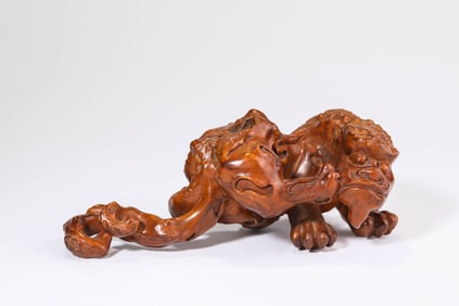 A BOXWOOD CARVED PIXIU
