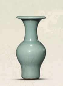 A CELADON BEAKER VASE
