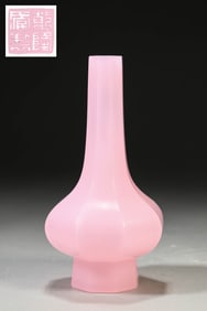 A GLASS HEXAGONAL VASE