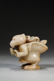 A JADE CARVED GARUDA