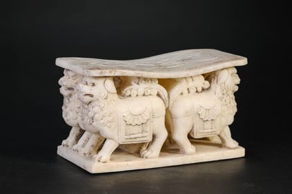 A WHITE MARBLE PILLOW