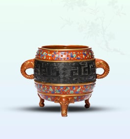 AN IRON-RED AND GILT TRIPOD CENSER