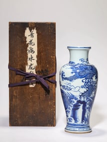 A BLUE AND WHITE 'DRAGON IN WAVES' VASE