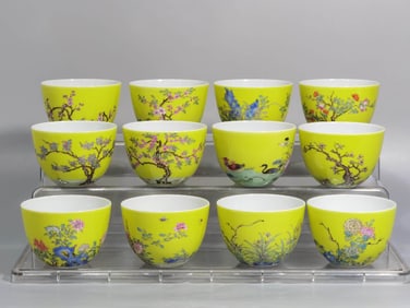 A SET OF YELLOW-GROUND ENAMEL 'TWELVE FLOWER GODDESSES' CUPS