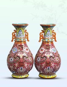 A RUBY RED YANGCAI REVOLVING VASE