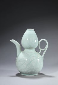 A HUTIAN CARVED EWER