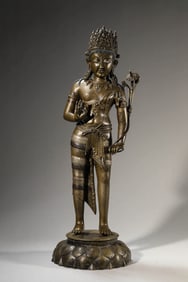 A TIBETAN GUGE-STYLE ALLOY COPPER AVALOKITESHVARA INLAID WITH SILVER AND COPPER