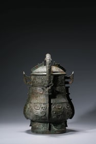 A BRONZE YOU WITH SWING HANDLE