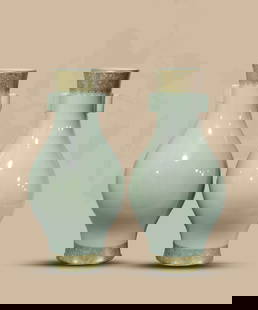 A PALE CELADON GLAZED AND GILT 'FLORAL' OLIVE-FORM VASE: A PALE CELADON GLAZED AND GILT 'FLORAL' OLIVE-FORM VASE Dimensions: Width: 19.5cm (7.68in) x Height: 40.5cm (15.94in). All measurements are approximate. Azaya Art Gallery is delighted to showcase our