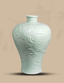 A PALE CELADON GLAZED 'DRAGON' MEIPING