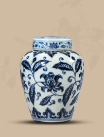 A BLUE AND WHITE 'INTERLOCKING FLOWERS' COVERED JAR