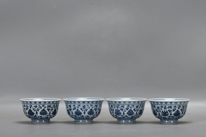A SET OF BLUE-AND-WHITE 'INTERLOCKING LOTUS AND MANDARIN DUCKS' CUPS