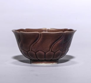 A PURPLE-GLAZED CUP