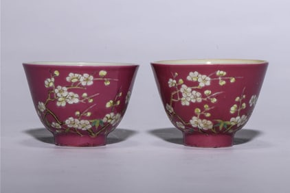A PAIR OF RUBY RED GLAZED 'PLUM BLOSSOMS' CUPS
