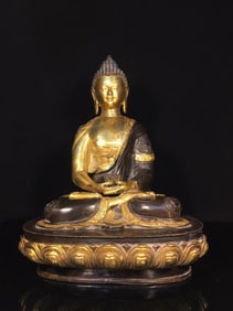 A GILT-COPPER SHAKYAMUNI STATUE