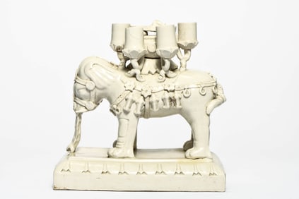 A WHITE-GLAZED 'ELEPHANT' INCENSE HOLDER