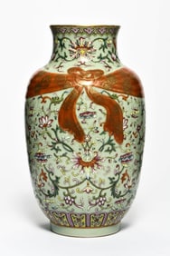 A PALE CELADON GLAZED GROUND FAMILLE ROSE 'INTERLOCKING FLOWERS' VASE