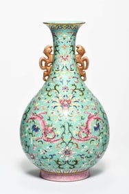 A TURQUOISE-GROUND FAMILLE ROSE 'DRAGON AND FLOWERS' VASE