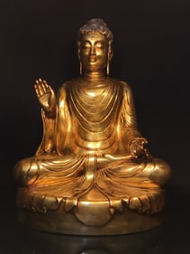 A GILT-COPPER SHAKYAMUNI STATUE