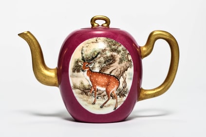 A FAMILLE ROSE 'AUSPICIOUS BEASTS' TEAPOT