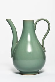A PALE CELADON GLAZED EWER