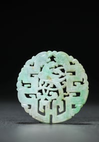 A JADEITE 'DRAGON-AND-PHOENIX' PENDANT