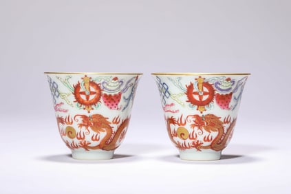 A PAIR OF IRON-RED 'EIGHT TREASURES AND DRAGON' CUPS
