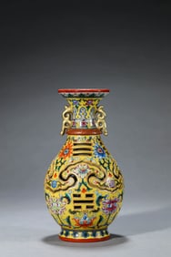 AN ENAMEL 'AUSPICIOUS' REVOLVING VASE